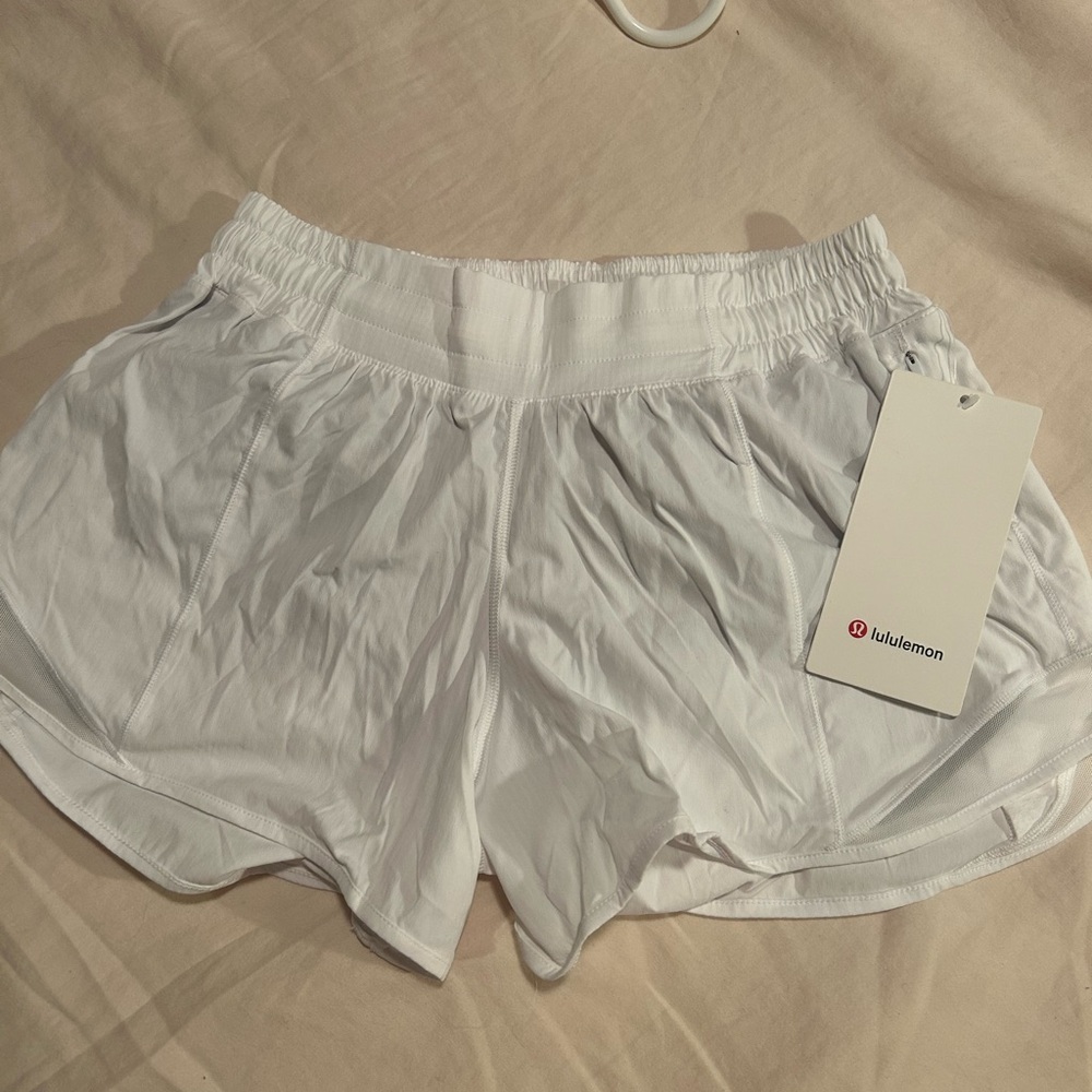 brand new white lululemon hotty hot shorts with tags!